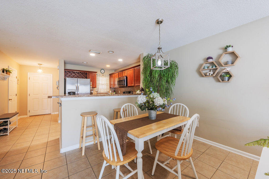 160 Crete Court St. Augustine, FL 32084 - Photo 8 of 33 a dining room with furniture and window