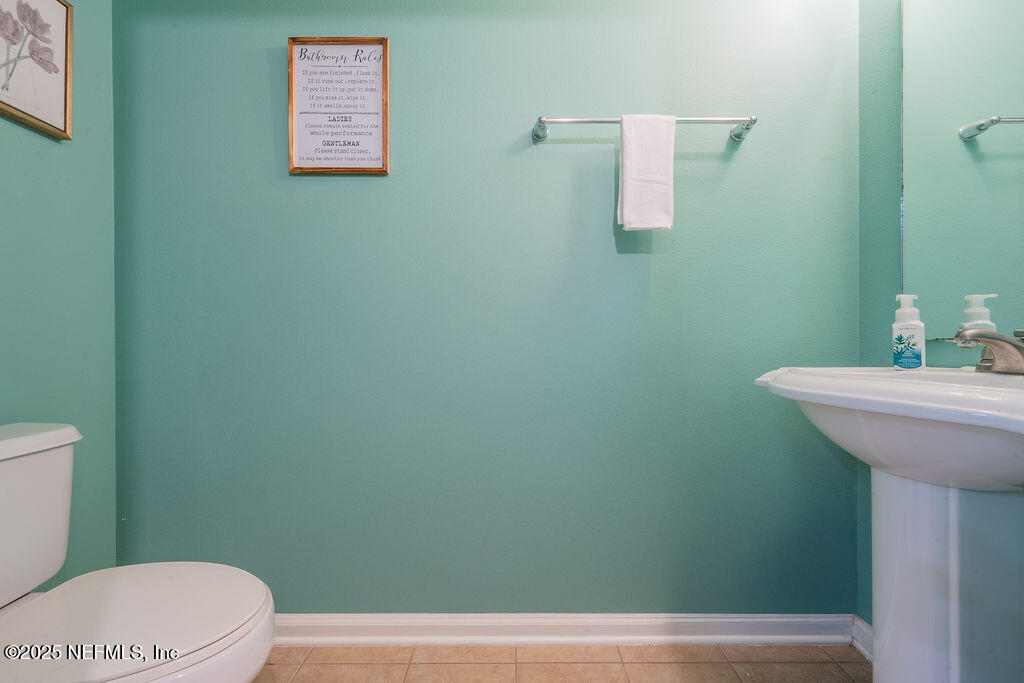 160 Crete Court St. Augustine, FL 32084 - Photo 10 of 33 a bathroom with a sink and a toilet