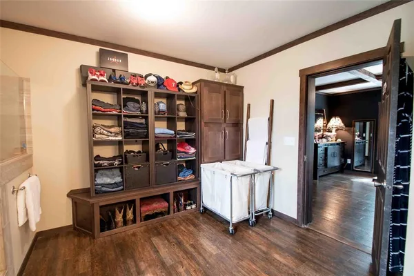 a room with furniture and a book shelf
