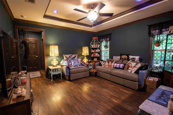 a living room with furniture and a fireplace