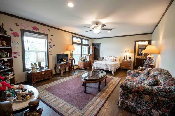 a bedroom with furniture or couch and a window