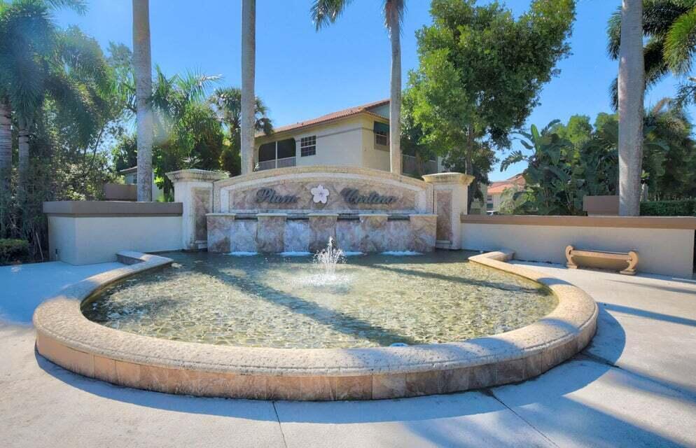 6630 Via Regina Boca Raton, FL 33433 - Photo 20 of 24 a view of a swimming pool with a patio