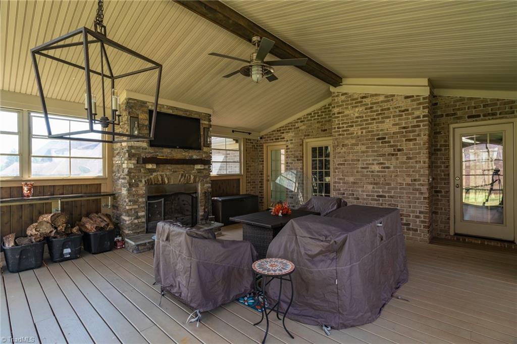 8174 Rob Roy Drive Summerfield, NC 27358 - Photo 35 of 47 Screened porch - granite entertainment bar