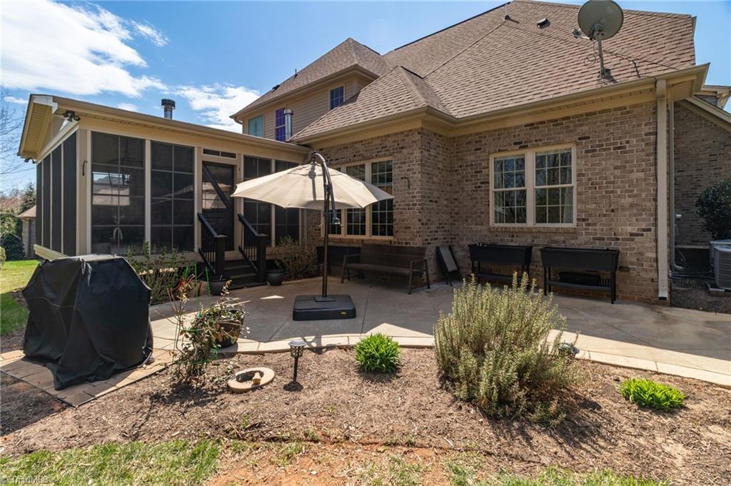 8174 Rob Roy Drive Summerfield, NC 27358 - Photo 39 of 47 Rear concrete patio