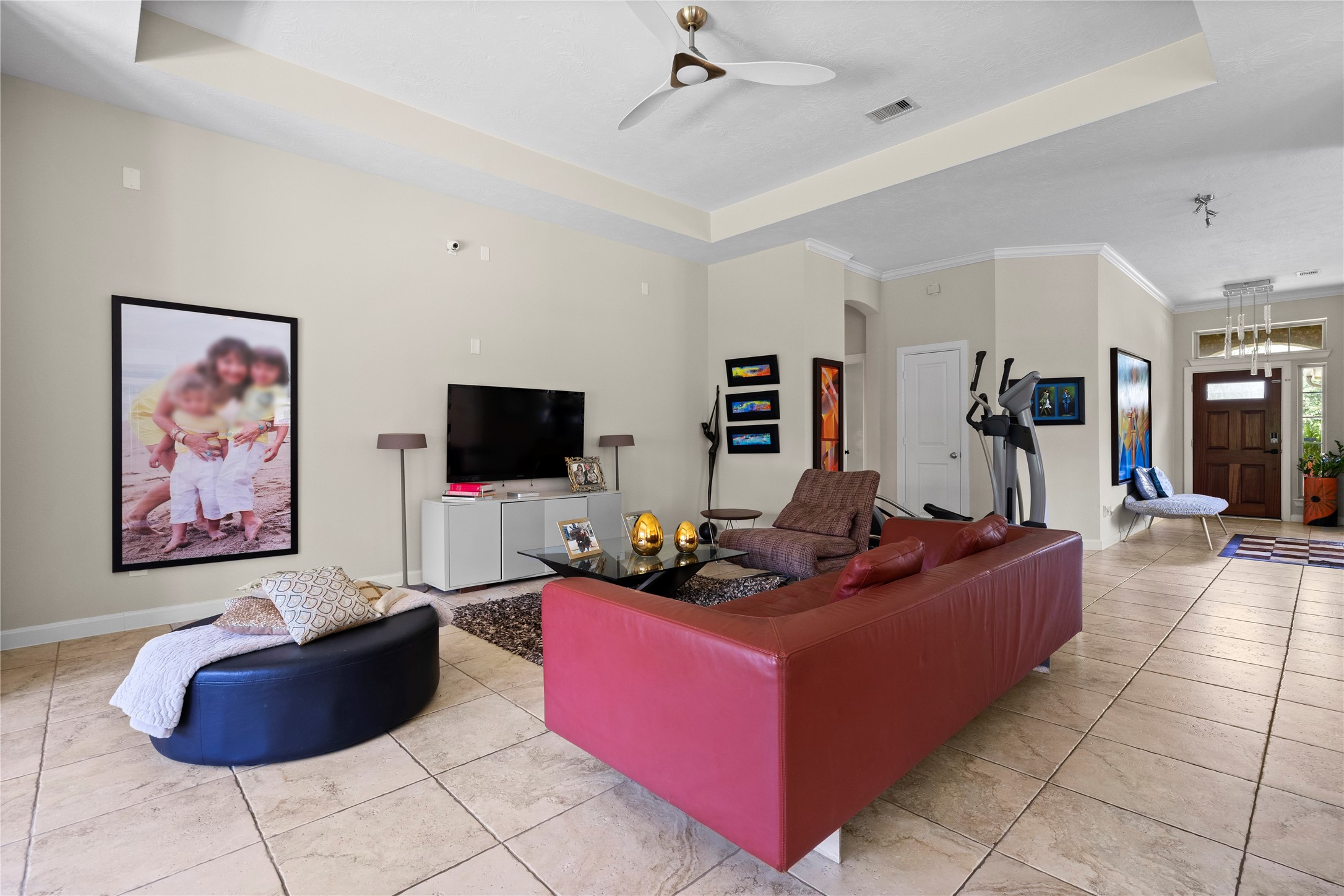 31503 Reston Cliff Court Spring, TX 77386 - Photo 9 of 28 a living room with furniture and a flat screen tv