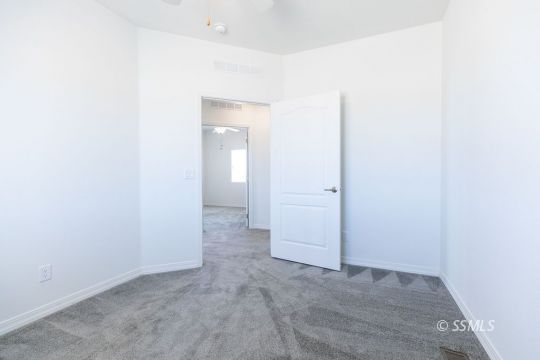 2014 South Brady Street Ridgecrest, CA 93555 - Photo 29 of 32 an empty room with mirror in it