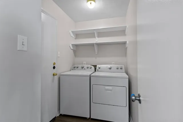 a utility room with dryer and washer