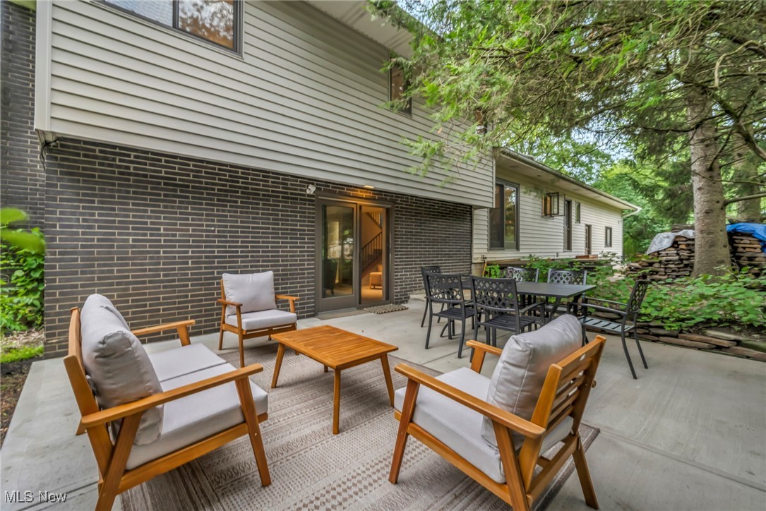 13962 Quarry Road Oberlin, OH 44074 - Photo 35 of 43 View of brand new patio with outdoor dining space and an outdoor hangout area