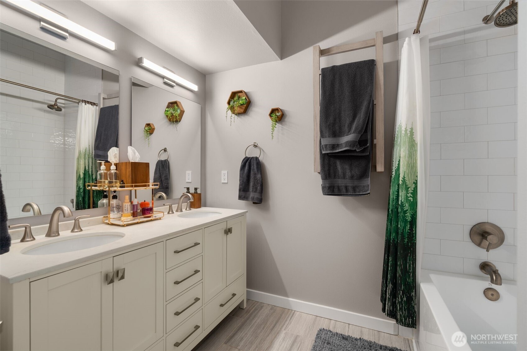 115 West Galer Street, Unit 101 Seattle, WA 98119 - Photo 13 of 19 a bathroom with a tub sink and mirror