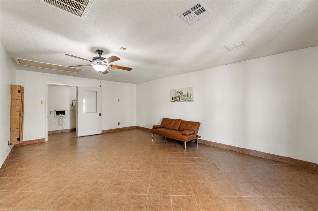 3433 West Tours Road West, TX 76691 - Photo 31 of 40 an empty room with fan