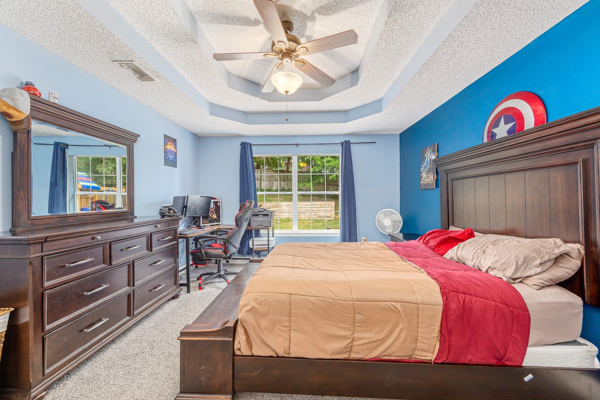 4451 Antioch Road Crestview, FL 32536 - Photo 22 of 34 a bedroom with a bed and a dresser