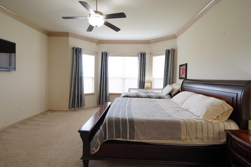 4508 Fox Rio Trail Arlington, TX 76017 - Photo 16 of 28 a bedroom with a bed and window