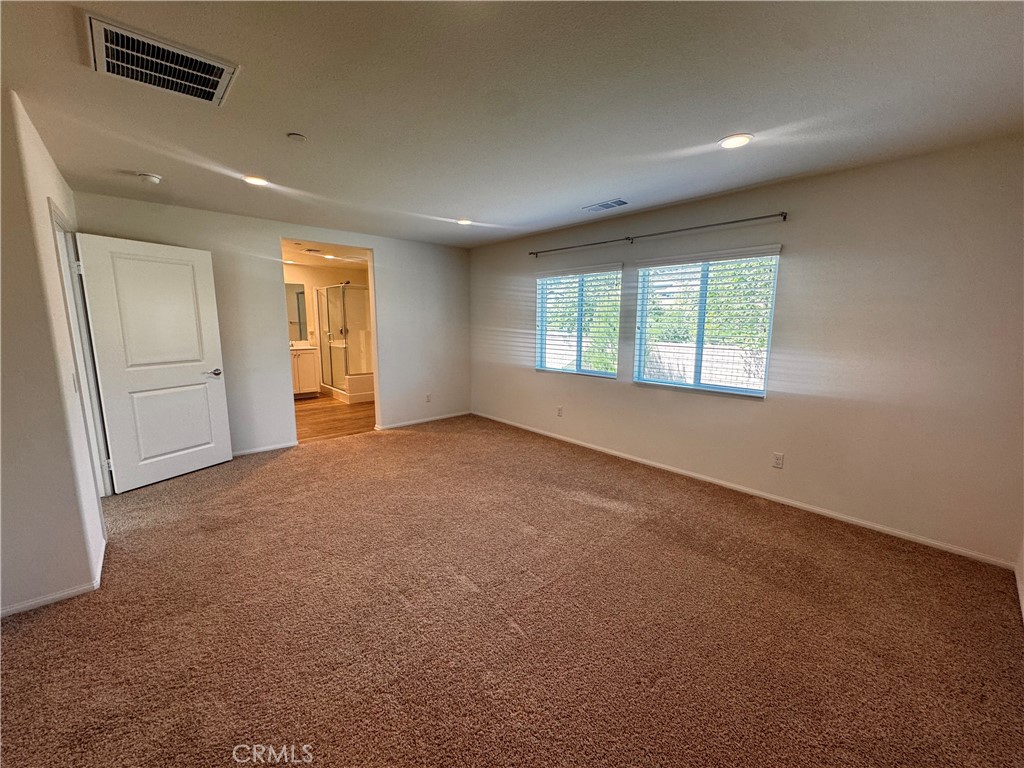 24054 Kerrigan Drive Menifee, CA 92587 - Photo 37 of 54 Primary bedroom