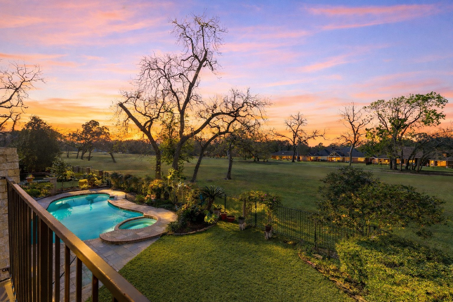 3122 Robinson Road Missouri City, TX 77459 - Photo 3 of 45 Panoramic views from the balcony overlooking the custom pool, professional landscaping, and the pristine golf course beyond.