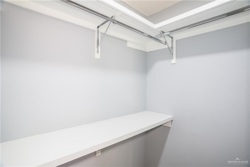 212 North Street Mission, TX 78572 - Photo 11 of 26 a view of a room with racks on the wall