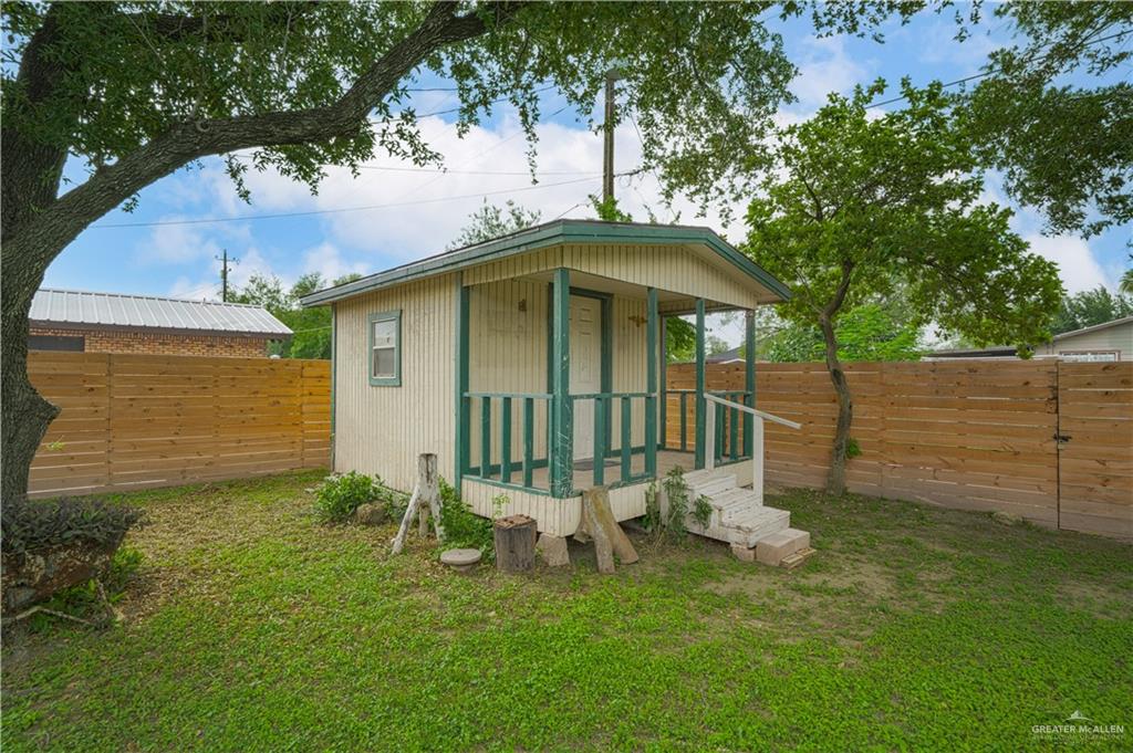 212 North Street Mission, TX 78572 - Photo 17 of 26 a front view of a house with a garden