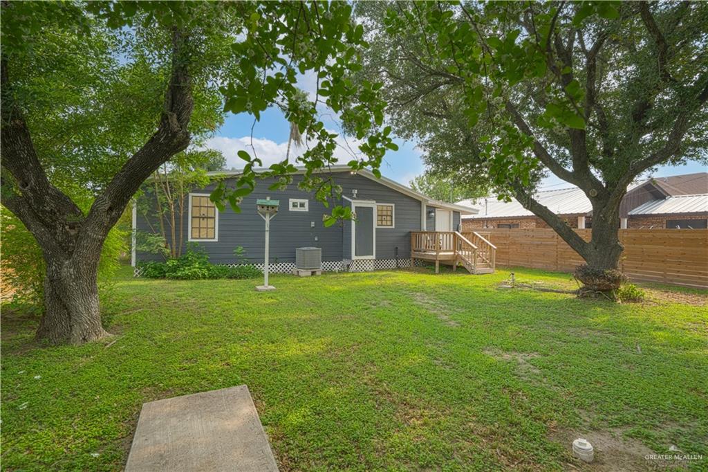 212 North Street Mission, TX 78572 - Photo 18 of 26 a front view of a house with a garden