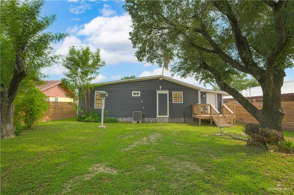 212 North Street Mission, TX 78572 - Photo 19 of 26 a front view of house with yard and green space