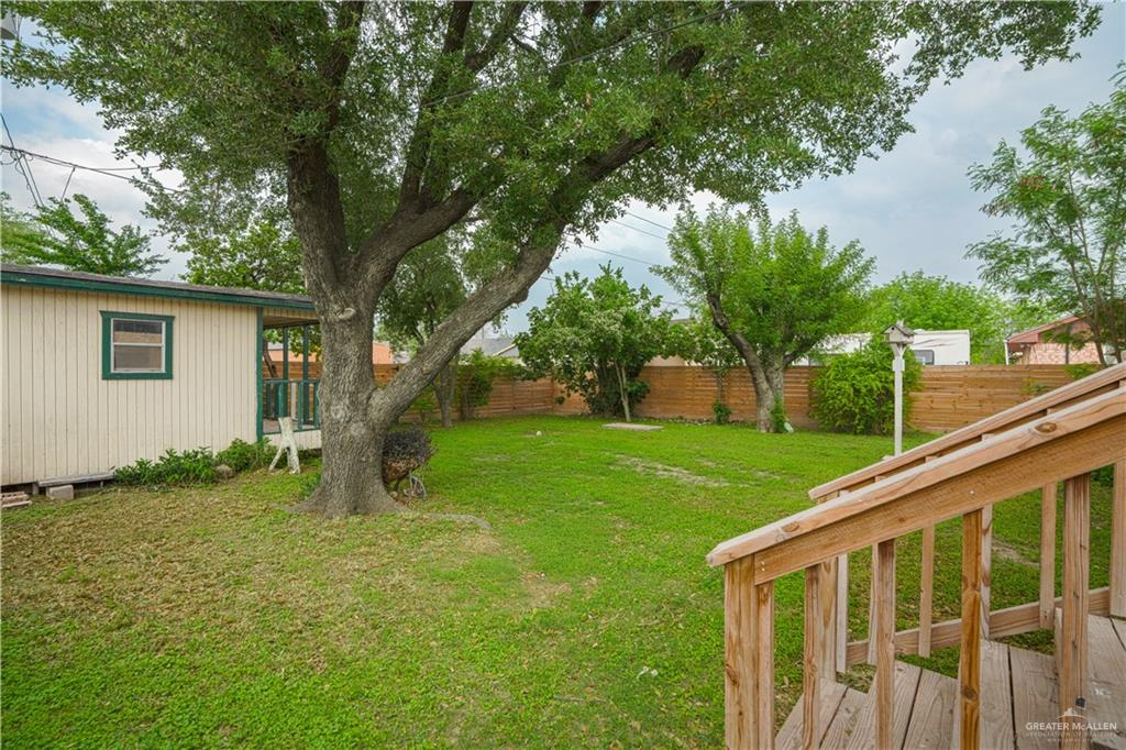 212 North Street Mission, TX 78572 - Photo 24 of 26 a view of a backyard with a large tree
