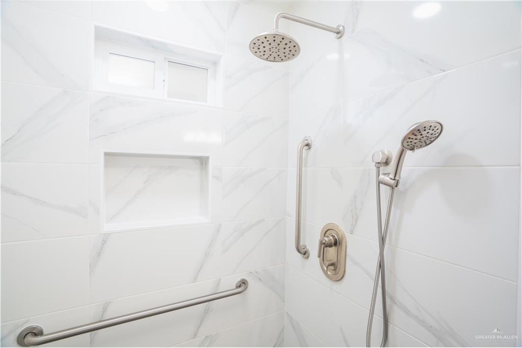 212 North Street Mission, TX 78572 - Photo 10 of 26 a bathroom with a shower