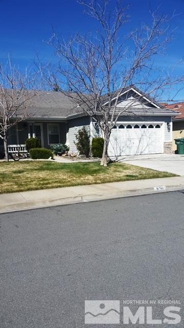 9761 Northmont Lane Reno, NV 89521 - Photo 1 of 1 a view of a house with a yard and sitting area