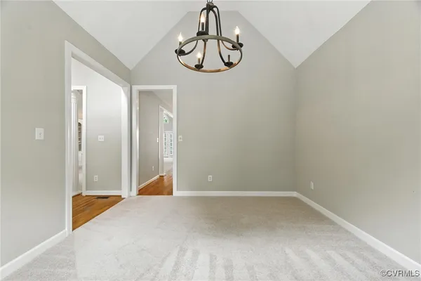 a view of a hallway with entryway