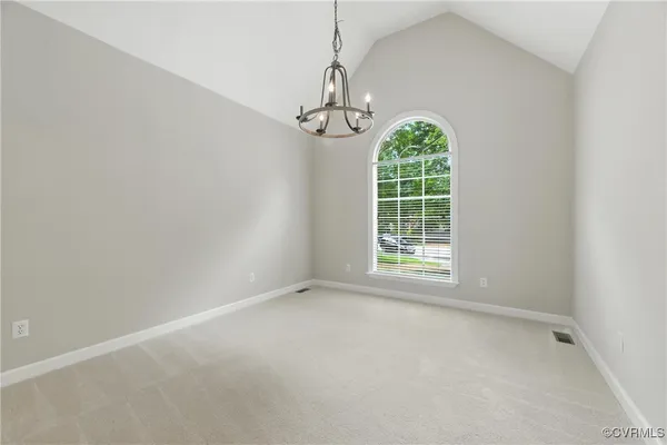 a view of big room with windows