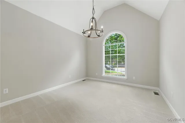 a view of big room with windows