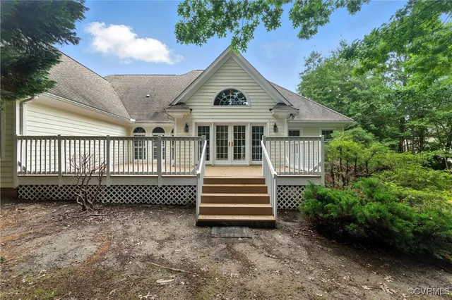 a view of an empty room and fire place