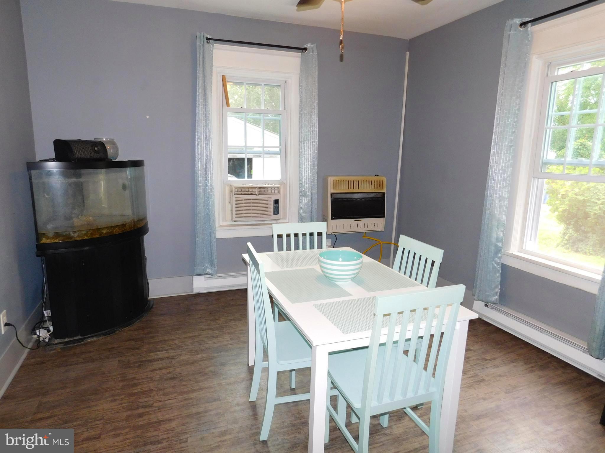 817 Union Landing Road Cinnaminson, NJ 08077 - Photo 9 of 30 Dining area with gas wall heater