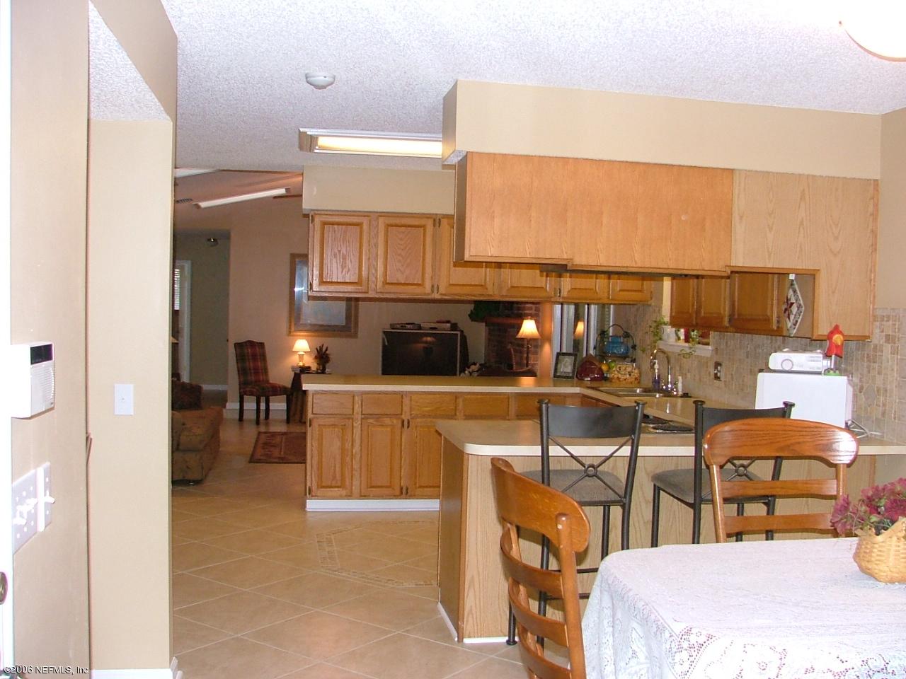 3845 Hartley Road Jacksonville, FL 32257 - Photo 5 of 12 Frm Brk Rm, Kit & FR beyond