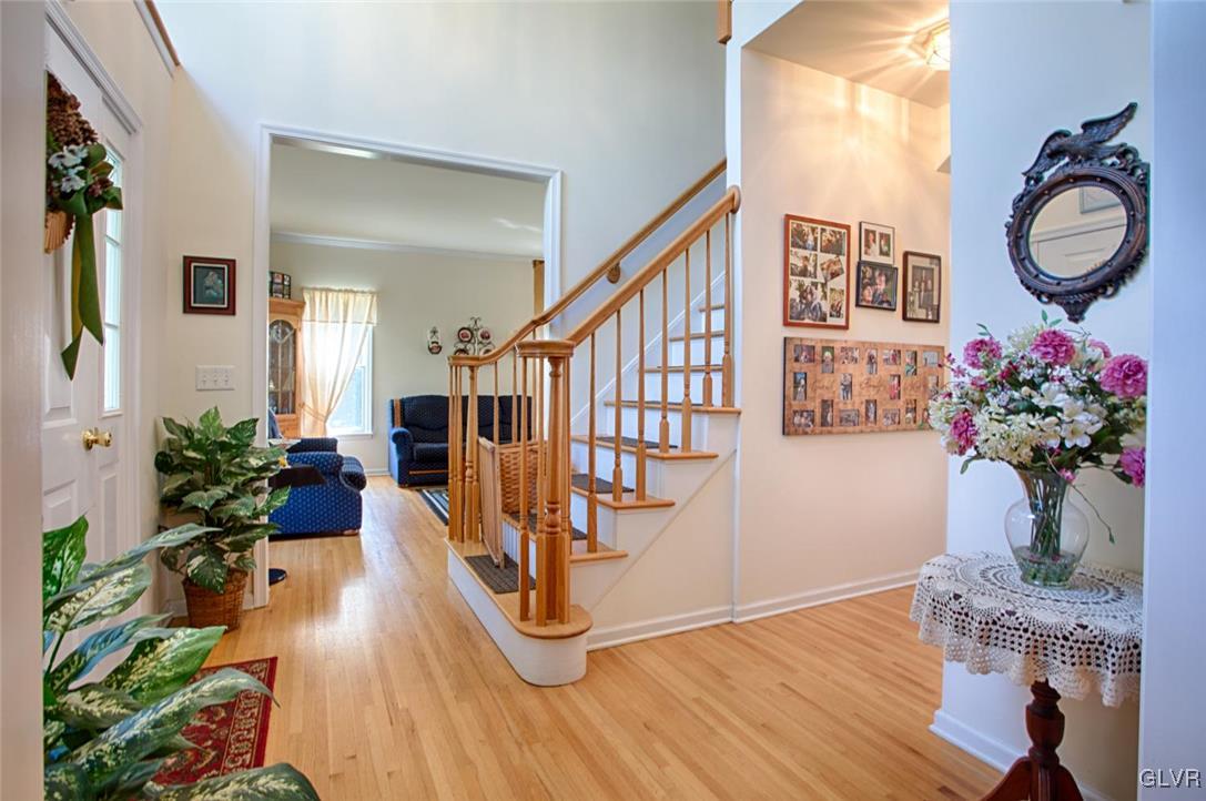 90 Morvale Road Easton, PA 18042 - Photo 3 of 38 a view of an entryway with wooden floor and a potted plant