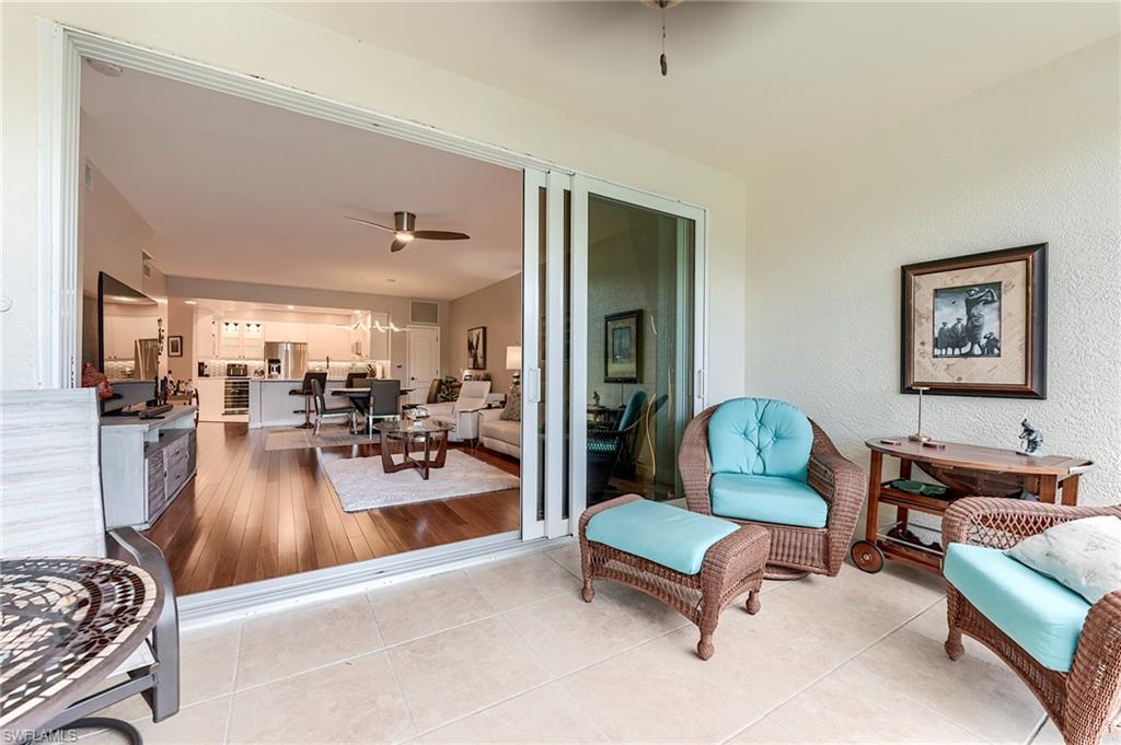 23815 Clear Spring Court, Unit 2105 Estero, FL 34135 - Photo 22 of 37 a view of a livingroom with furniture and a living room