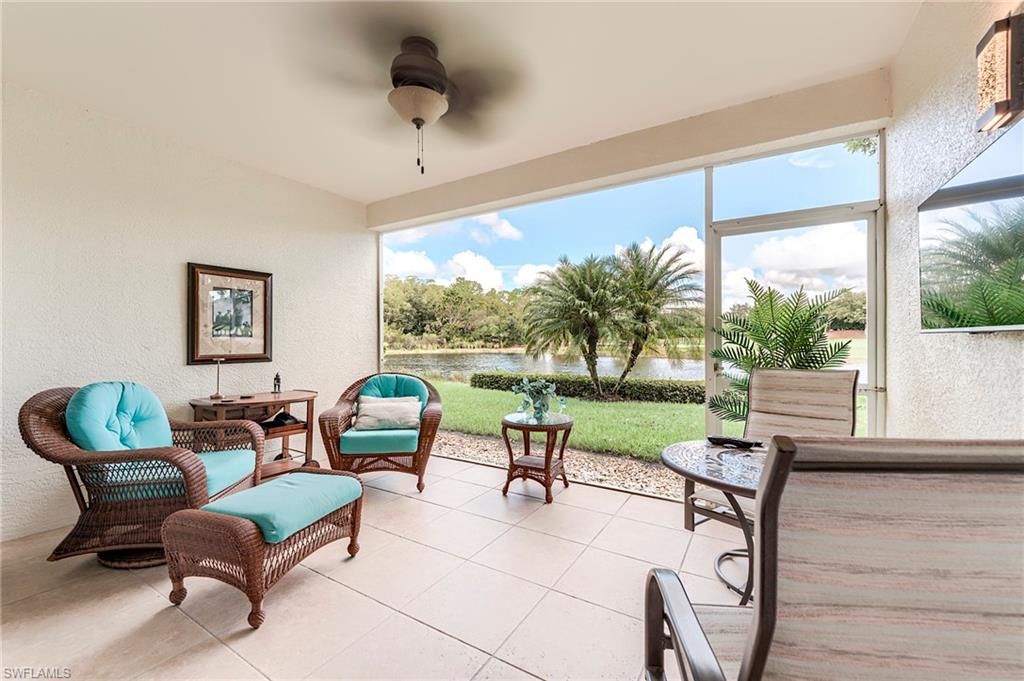 23815 Clear Spring Court, Unit 2105 Estero, FL 34135 - Photo 23 of 37 a living room with furniture and a garden