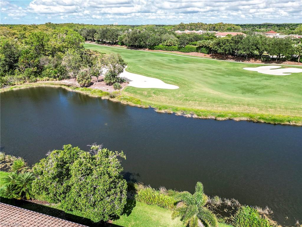 23815 Clear Spring Court, Unit 2105 Estero, FL 34135 - Photo 27 of 37 a view of a lake with a lake