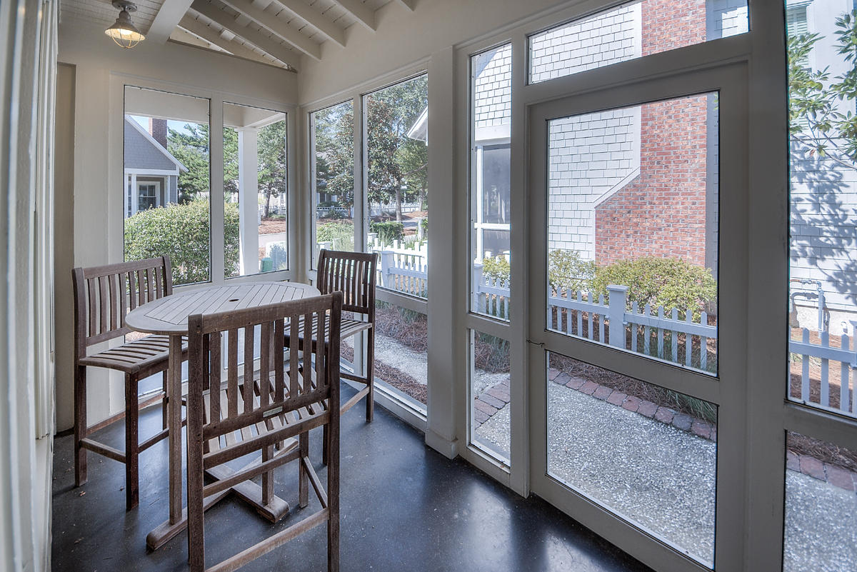 295 Salt Lane Inlet Beach, FL 32461 - Photo 17 of 26 a view of a room with a large window and wooden floor
