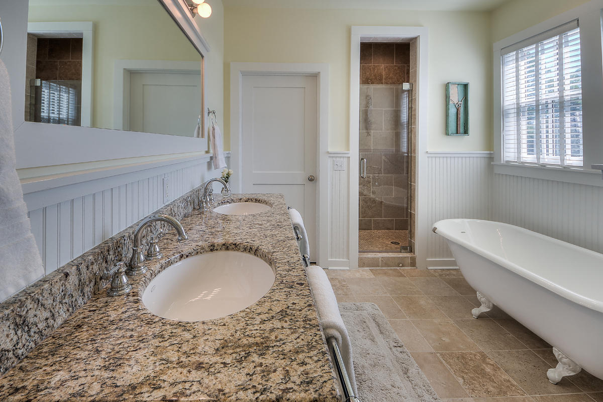 295 Salt Lane Inlet Beach, FL 32461 - Photo 8 of 26 a bathroom with a granite countertop sink a toilet and shower