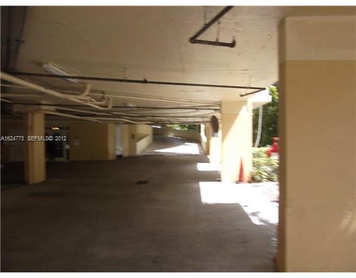 2475 Northwest 16th St Road, Unit 207 Miami, FL 33125 - Photo 11 of 11 Exterior Front