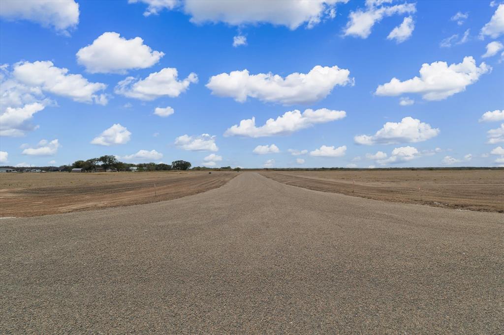 Lot 21 High Meadow Road Elm Mott, TX 76640 - Photo 10 of 12 a view of an ocean and a building