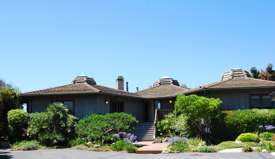 815 Sand Point Road Carpinteria, CA 93013 - Photo 11 of 12 a view of a house with a yard and plants
