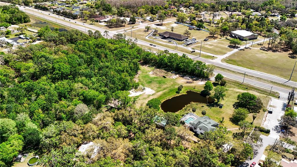 9240 Creston Avenue New Port Richey, FL 34654 - Photo 39 of 39 an aerial view of residential houses with outdoor space