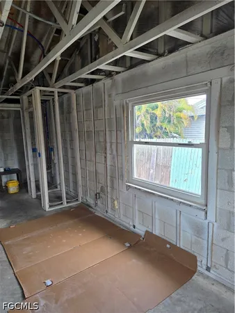 a view of an empty room with a balcony