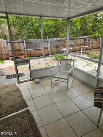 a view of swimming pool with outdoor seating
