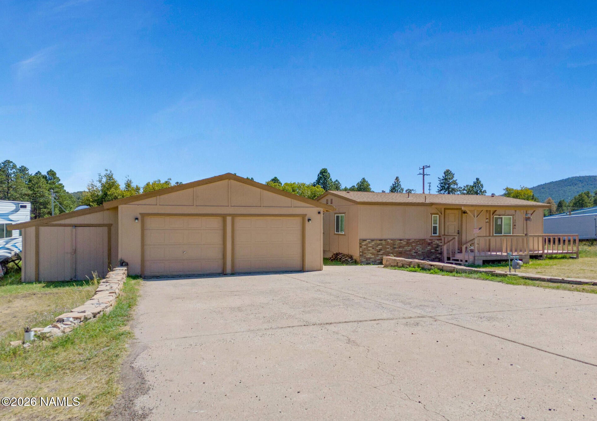 1050 North Arpt Road Williams, AZ 86046 - Photo 2 of 29 a house view with a outdoor space