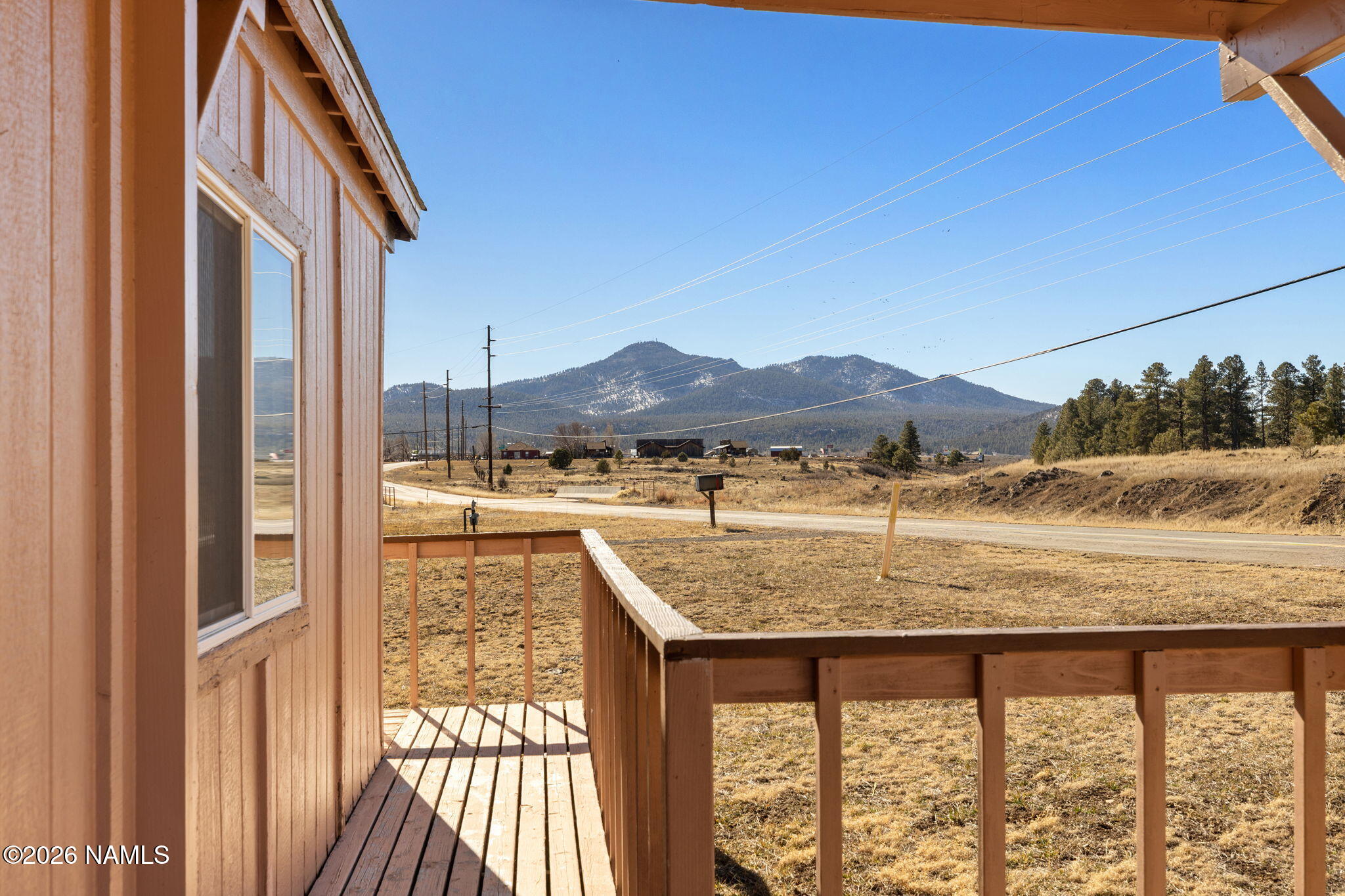 1050 North Arpt Road Williams, AZ 86046 - Photo 21 of 29 a view of balcony with furniture and a yard