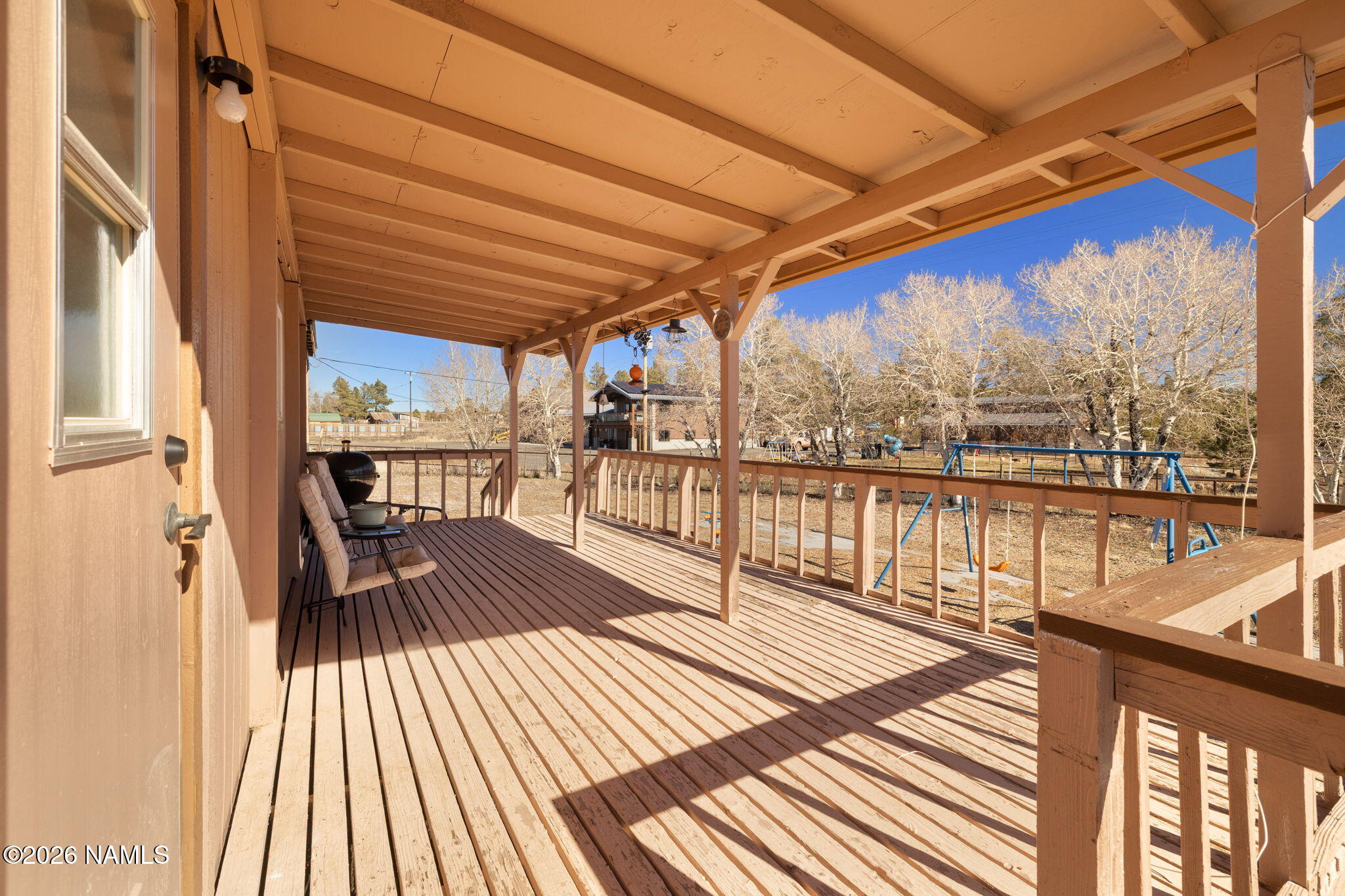1050 North Arpt Road Williams, AZ 86046 - Photo 22 of 29 a view of a balcony with wooden floor