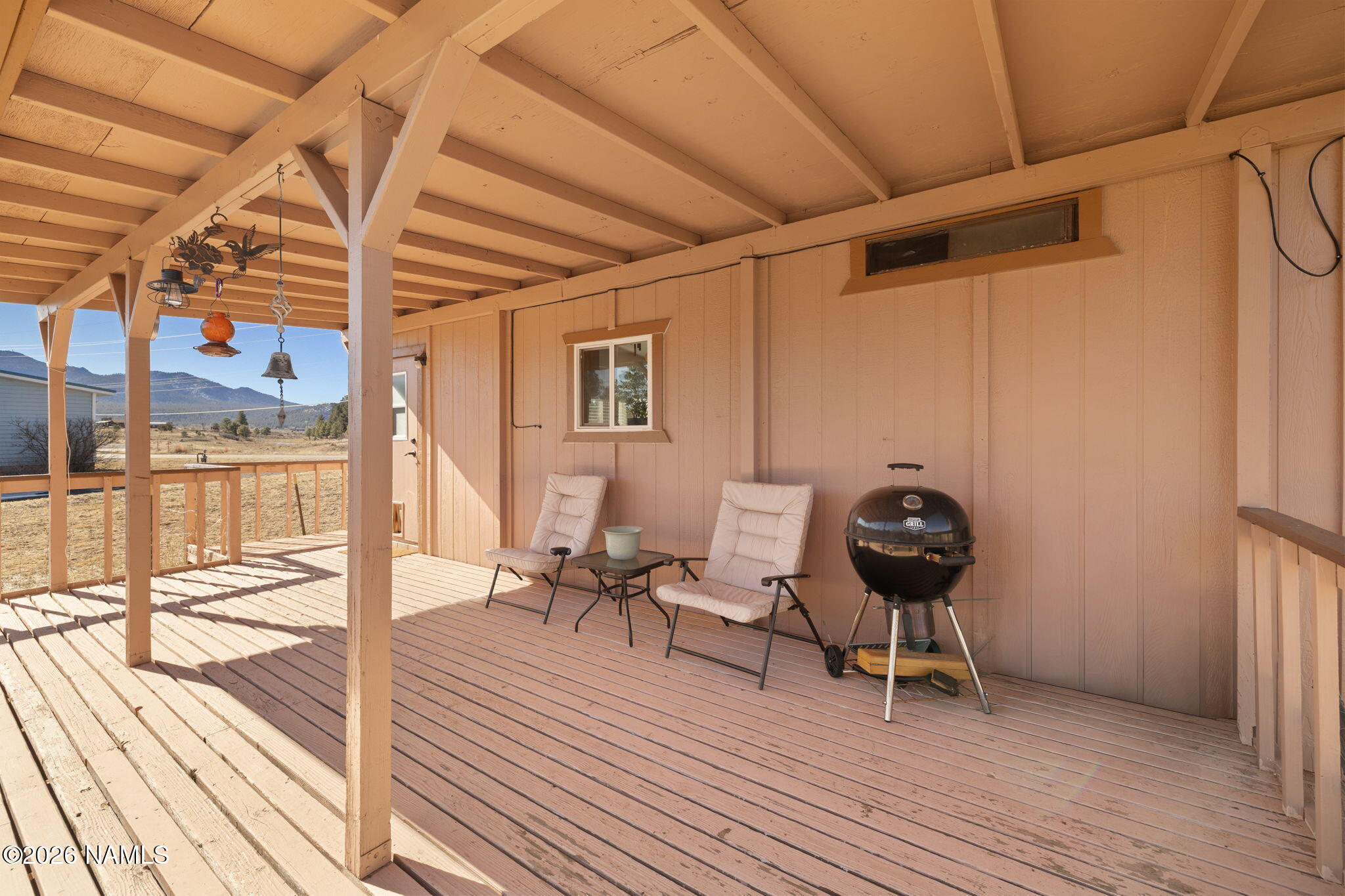 1050 North Arpt Road Williams, AZ 86046 - Photo 23 of 29 a living room with a couch and wooden floor