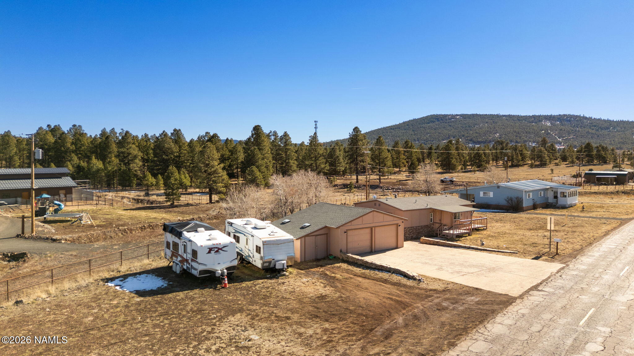 1050 North Arpt Road Williams, AZ 86046 - Photo 28 of 29 a view of a terrace with chairs
