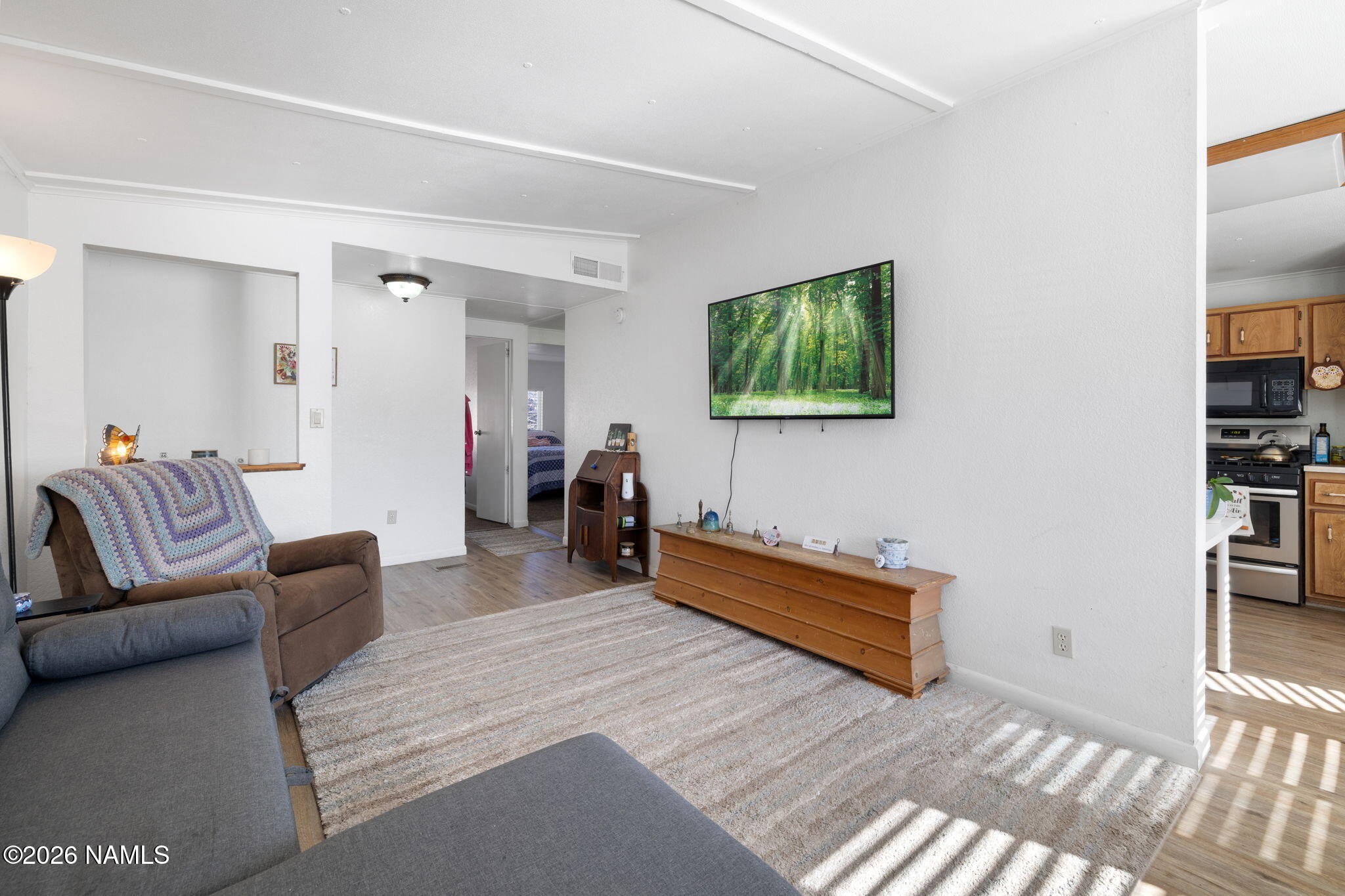 1050 North Arpt Road Williams, AZ 86046 - Photo 8 of 29 a living room with furniture and a couch