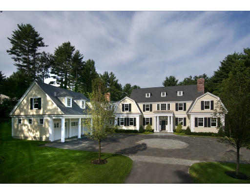 15 Walnut Road Weston, MA 02493 - Photo 1 of 10 a front view of a house with a garden